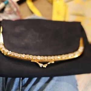 Elegant Black Clutch with Gold Accents